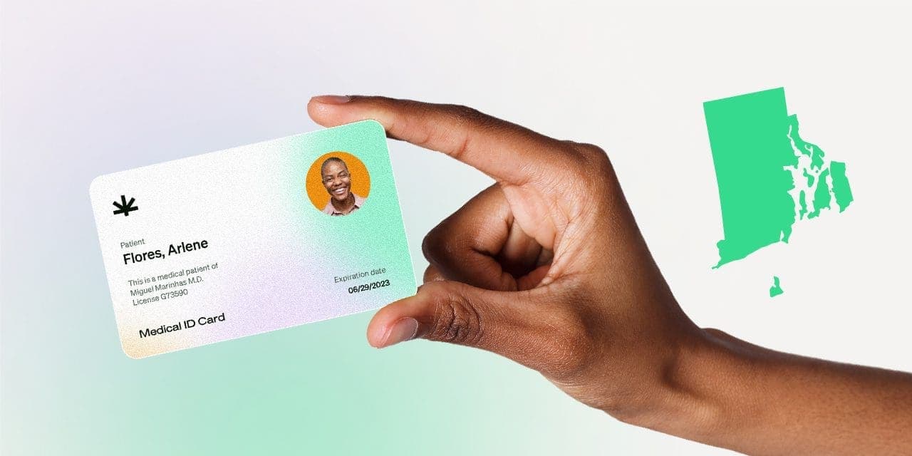 closeup hand holding MMJ card